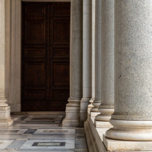 Row of column in colonnade. Classical style colonnade in Rome, Italy