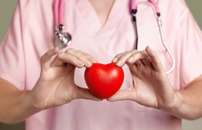 Cardiologist with heart